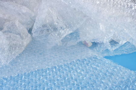 An abstract image of clear plastic wrap used in packaging.
