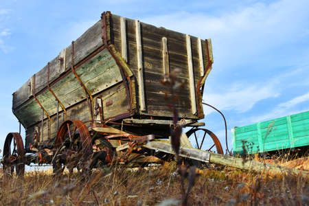 An image of an old horse drawn wooden wagon used by farming pioneers.の写真素材