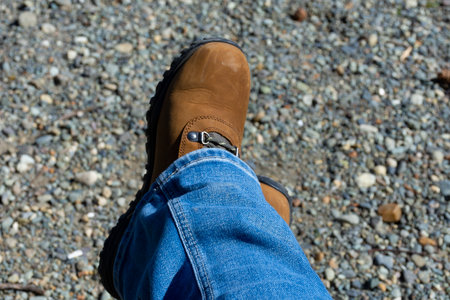 A close up image of a pair of ladies tan colored hiking boots.の写真素材