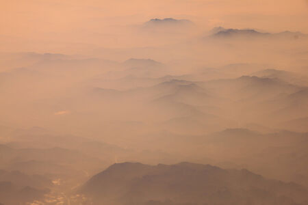 Winter landscape mountain from planeの写真素材