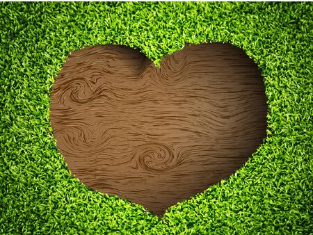 the heart of the grass on a wooden background the heart of the grass on a wooden background
