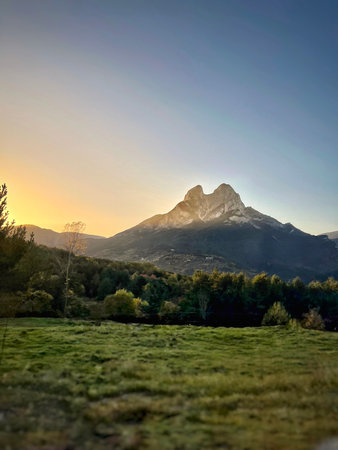 sunset and sunrise in the mountainsの写真素材