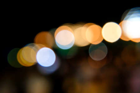 Bokeh orange night lights scene with circular lighting.の写真素材