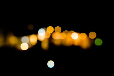 Bokeh orange night lights scene with circular lighting.の写真素材