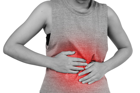 Inflammation colored in red suffering. stomach painful suffering from stomachache causes of menstruation period, gastric ulcer, appendicitis or gastrointestinal system disease. Healthcare and health insurance concept - isolated on white background with clipping path.の写真素材
