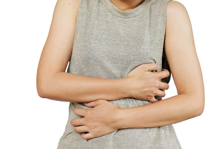 Inflammation colored in red suffering. stomach painful suffering from stomachache causes of menstruation period, gastric ulcer, appendicitis or gastrointestinal system disease. Healthcare and health insurance concept - isolated on white background with clipping path.の写真素材