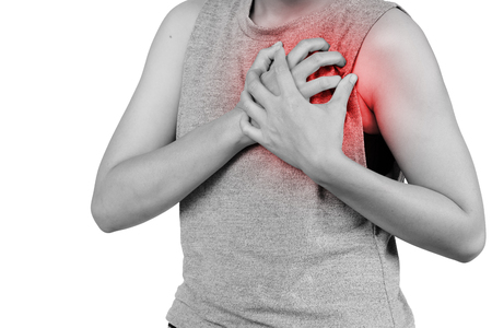 Inflammation colored in red suffering. woman clutching his chest from acute pain, Heart attack symptom. Healthcare and health insurance concept - isolated on white background with clipping path.の写真素材