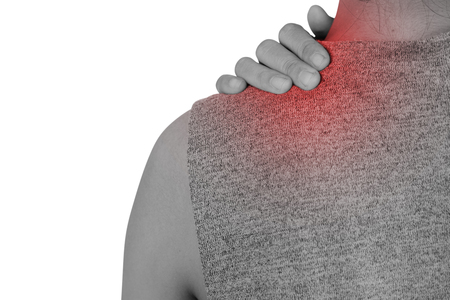 Woman with muscle injury having pain in her neck and shoulder, Health care and medical concept - isolated on white background with clipping path.の写真素材