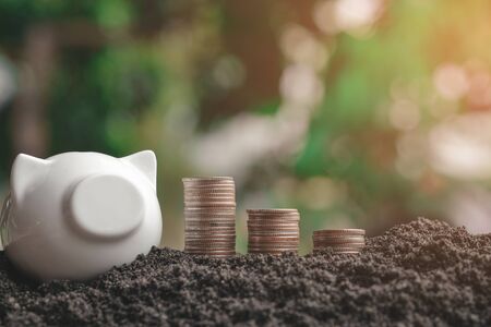 money stack step up growing growth saving money with icons about business strategy on image, ideas about saving money for future use - business success concept.の写真素材
