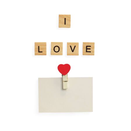 The words I LOVE YOU made with wooden letters, love and Valentines day, heart symbol. solated on white background with clipping path.の写真素材