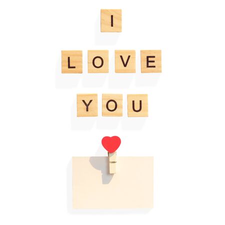 The words I LOVE YOU made with wooden letters, love and Valentines day, heart symbol. solated on white background with clipping path.の写真素材