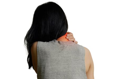 Woman with muscle injury having pain in her neck and shoulder, Health care and medical concept - isolated on white backgroundの写真素材