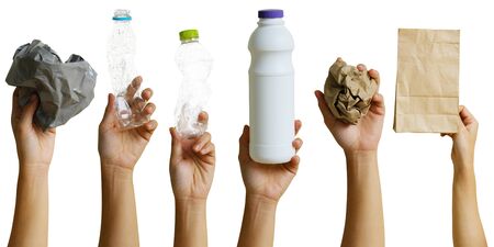 Hand of volunteer holding recyclable waste isolated on white background,  recycle concept.の写真素材
