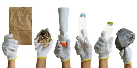 Hand of volunteer in White gloves holding recyclable waste isolated on white background,  recycle concept.の写真素材
