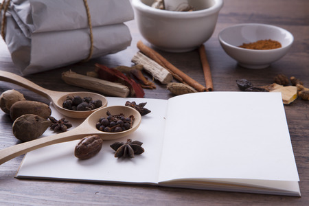 Herbal seed and other medicine on wood tableの写真素材