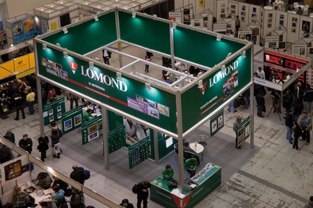Kiev, Ukraine - May 07, 2011 - Visitors visit Lomond booths during 9th International PhotoFair trade show at International Exhibition Center. のeditorial素材