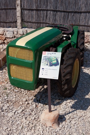 Nova Vas, Croatia - August 02, 2011: Antique tractor Ferrari MC-60 1962 on display at The Exhibition Of Old Tractors And Display Of Items About Bread, Oil And Wine. のeditorial素材