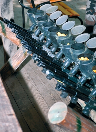 Paintball guns charged and ready for the gameの写真素材