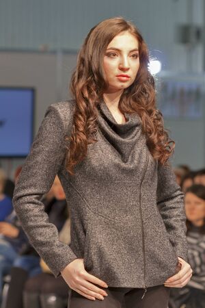 KIEV, UKRAINE - FEBRUARY 20: Fashion model at Kyiv Fashion 2013 show in KyivExpoPlaza exhibition center on February 20, 2013 in Kiev, Ukraine. It is the 23 edition of the International Vogue Festival.のeditorial素材