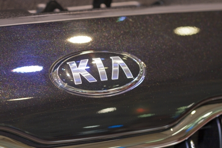 KIEV, UKRAINE - MAY 29: KIA logo on new Korean car model Quoris hood on display of SIA' 2013 The 21st Kyiv International Motor Show in International Exhibition Centre on May 29, 2013 in Kiev, Ukraine.のeditorial素材