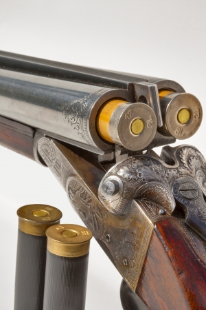 hunting vintage rifle charged with additional cartridges macroの写真素材
