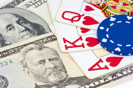 gambling concept with dollar bills, chip and playing cardsの写真素材