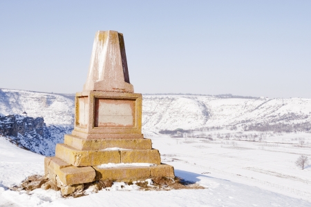 unknown old monument over Orhei Vechi winter valley in Moldovaの写真素材