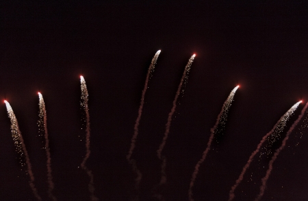 A bright burst of fireworks against black skyの写真素材