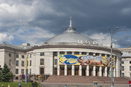 KIEV, UKRAINE - JUNE 05: Pedestrians walk along the building of Kiev Circus opened in 1960 on June 05, 2013 in Kiev, Ukraine. Circus for up to 1,907 places was designed by architect V. Zhukov in 1950.のeditorial素材
