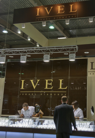 Visotor visit IVEL Israel diamonds booth at Jeweller Expo Ukraine 2013 international exhibition in KyivExpoPlaza exhibition centerのeditorial素材