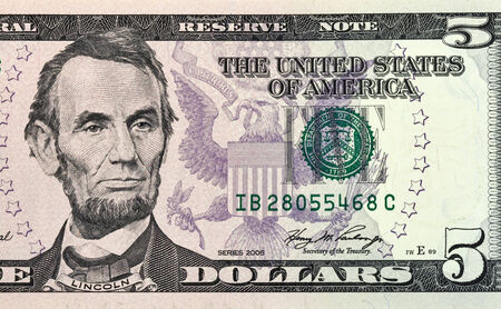 Portrait of Lincoln from five dollars bill new edition macro