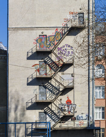 KIEV, UKRAINE - FEBRUARY 18, 2014: Unknown artists street graffiti on building wallのeditorial素材