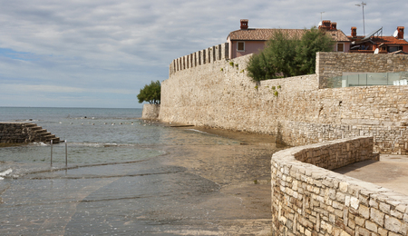 Ancient walls and waterfront. Novigrad, Croatia.の写真素材