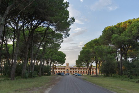PISA, ITALY - SEPTEMBER 03, 2014: Cars parked in front of Casale la Sterpaya hotel in Regional Park of San Rossore, Tuscany. It is an old farmhouse outbuilding of the stables of Royal Savoia Family, restored and intended to lodge visitor center and refresのeditorial素材