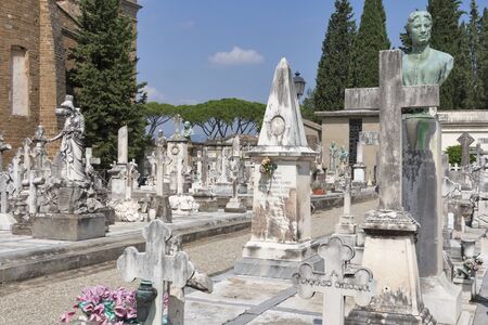 FLORENCE, ITALY - SEPTEMBER 09, 2014: Graves and tombs of old cemetery delle Porte Sante close to Basilica San Miniato al Monte (St. Minias on the Mountain). The Porte Sante cemetery was laid out in 1854 atop one of the highest points in the city.のeditorial素材