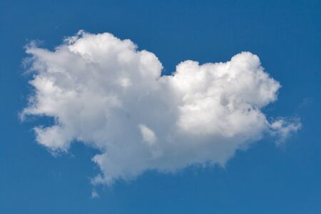 White cloud against clear and blue skyの写真素材