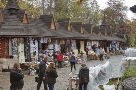 YAREMCHE, UKRAINE - OCTOBER 17,2014: People visit outdoor souvenir market with hand made goods. Yaremche is a Carpathian town in Ivano-Frankivsk province of West Ukraine.のeditorial素材