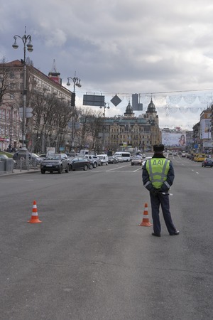 KIEV, UKRAINE - APRIL 5, 2015: State Traffic Police DAI serves on Khreshchatyk city street. National Police replaced DAI in July 2015 as a part of reforms launched by Ukrainian president Poroshenko.のeditorial素材