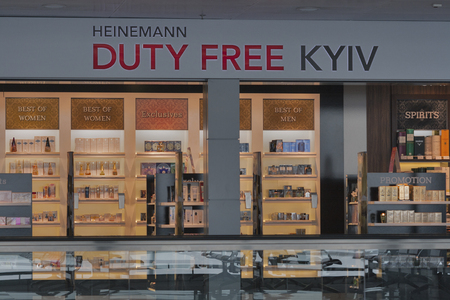 KIEV, UKRAINE - FEBRUARY 08, 2015: Heinemann Duty Free shop display in Kyiv Boryspil International Airport. Duty free shops are retail outlets that are exempt from the payment of certain taxes.のeditorial素材