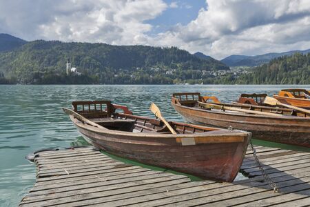 Boats at the pier of the Lake Bled, Slovenia.の写真素材
