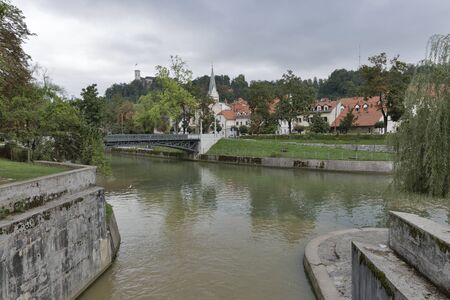 Confluence of Ljubljanica and Gradascica rivers and Hradeckega bridge in Ljubljana, Sloveniaの写真素材