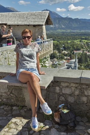 BLED, SLOVENIA - SEPTEMBER 07, 2015: Unrecognized tourists visit Bled Castle. It is situated in Julian Alps of Upper Carniolan region of northwestern Slovenia, 55 km from the capital city Ljubljana.のeditorial素材