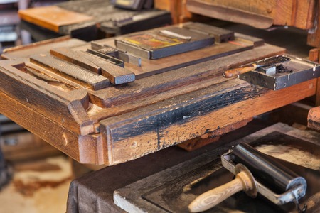 BLED, SLOVENIA - SEPTEMBER 07, 2015: Medieval wooden printing machine closeup in Bled Castle. Castle is situated in Julian Alps of Upper Carniolan region of northwestern Slovenia.のeditorial素材