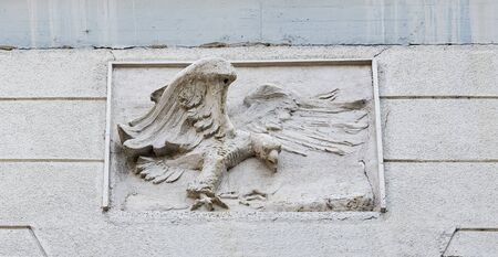 Maribor old decorated house facade with eagle bas relief closeup, Sloveniaの写真素材