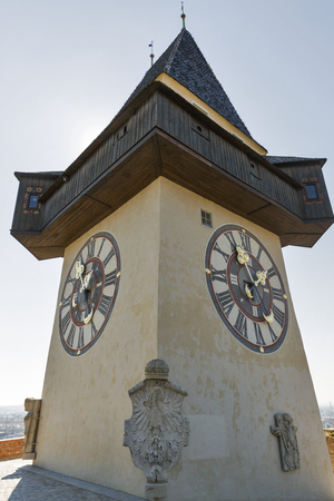 old clock tower Uhrturm on Schlossberg fortress in Graz, Austriaのeditorial素材