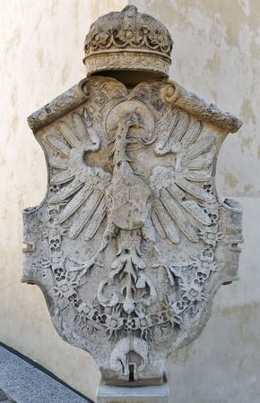 Ancient Coat of Arms on Schlossberg Castle clock tower Uhrturm wall in Graz, Austriaのeditorial素材