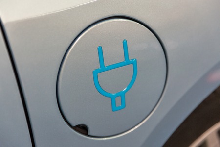 Charging symbol on electric car closeupの写真素材