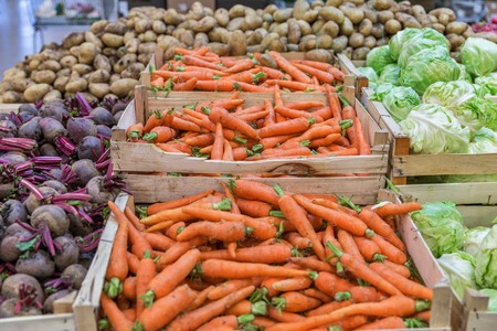 Vegetables on a market show window closeup