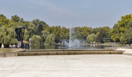 BUDAPEST, HUNGARY - SEPTEMBER 23, 2015: Unrecognized people have a rest in the City Park (Varosliget), a public park close to the city centre, located near the famous Heroes' Square (Hosok tere).のeditorial素材