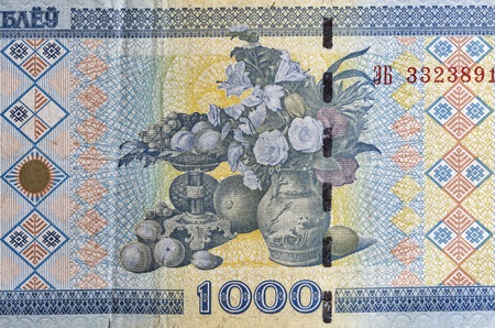 used 1000 ruble old bill of Belarus fragment macro with the fragment of the picture Portrait of the...